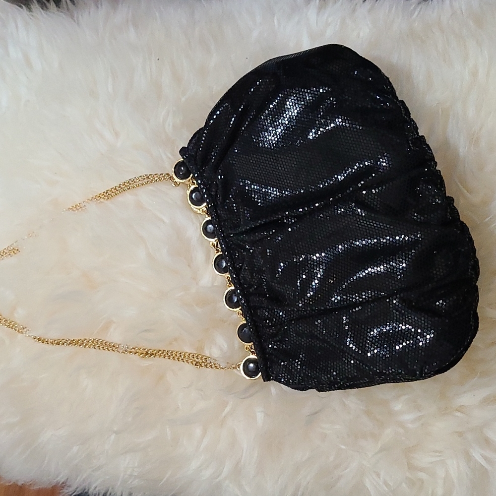 Clara Kasavina wrist evening bag glitzy black with gold chain